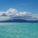 Turquoise ocean waves on a sandy beach in Mayotte